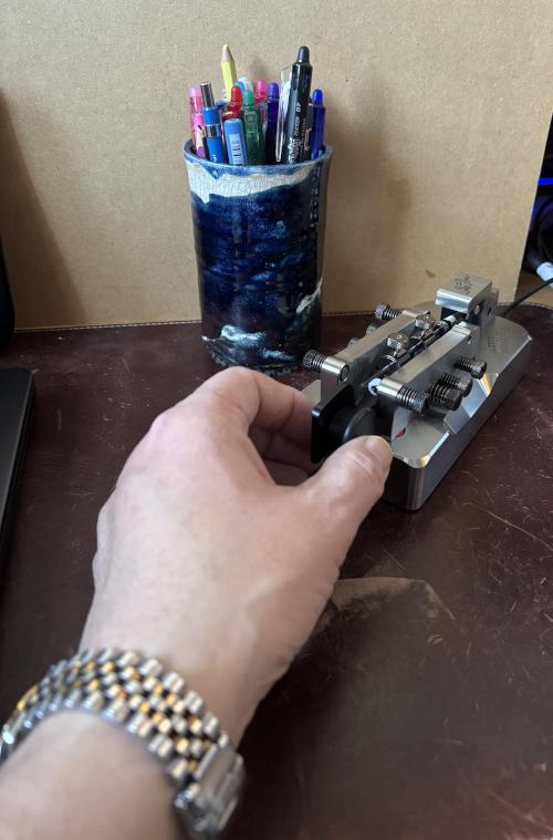 Begali Galaxy bug key in use on the desk