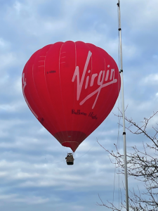 Image of antenna mast and hot air balloon